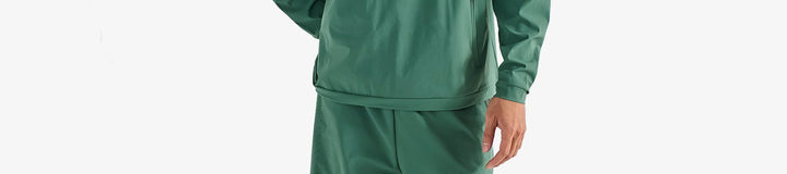PERFORMANCE QUARTER ZIP SHELL PULLOVER
