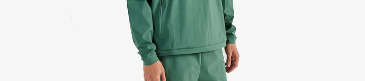 PERFORMANCE QUARTER ZIP SHELL PULLOVER