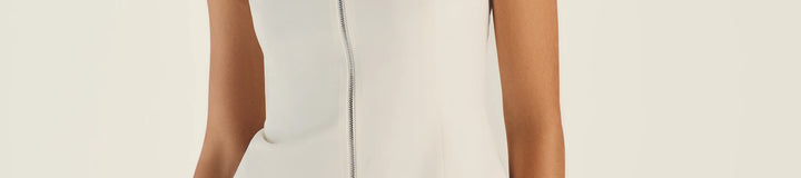 GEMMA ZIP SLEEVELESS POLO