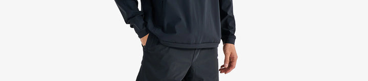 PERFORMANCE QUARTER ZIP SHELL PULLOVER