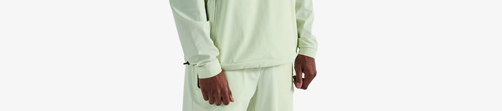 PERFORMANCE QUARTER ZIP SHELL PULLOVER
