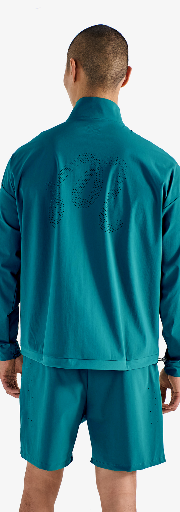 PERFORMANCE QUARTER ZIP SHELL PULLOVER