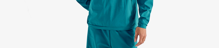 PERFORMANCE QUARTER ZIP SHELL PULLOVER