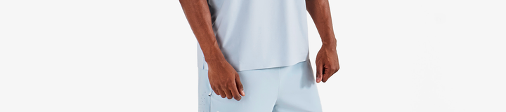 PERFORMANCE ZIP RAGLAN POLO