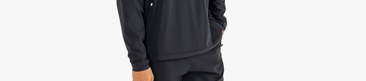 PERFORMANCE QUARTER ZIP SHELL PULLOVER