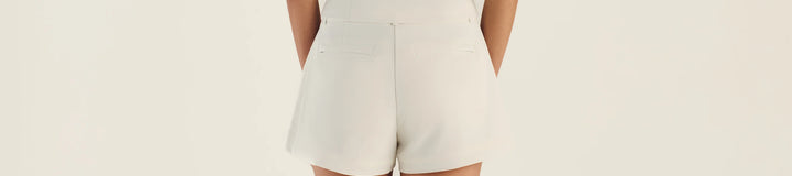 GEMMA ZIP SLEEVELESS POLO
