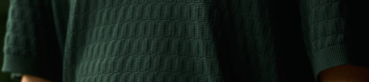 CREST KNIT POLO