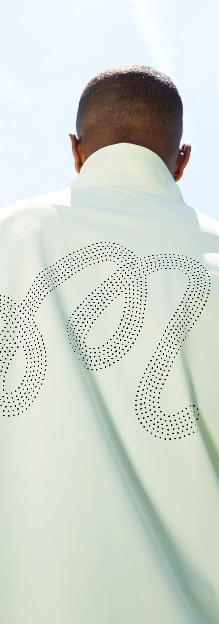 PERFORMANCE QUARTER ZIP SHELL PULLOVER